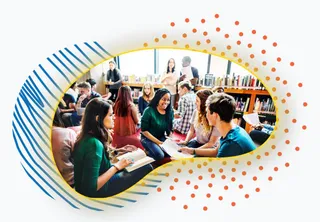 students_in_library2 Group of students talking in a library
